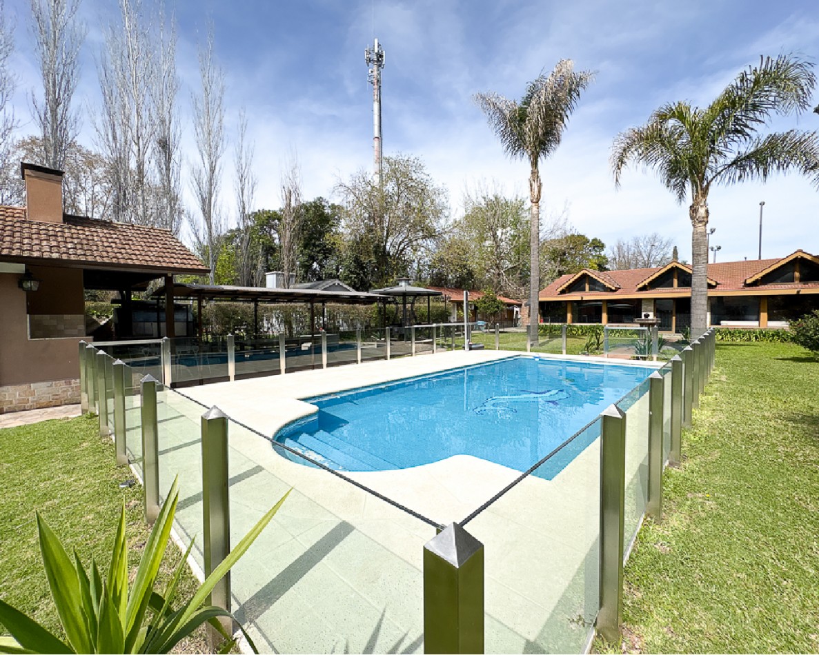 Hermosa Casa con 2 Quinchos y Casa de Huespedes en El Cortijo